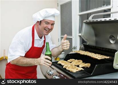 A man in a chef hat cooking chicken and shrimp on the barbecue grill.