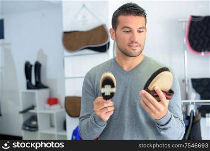 a man is choosing the right brush