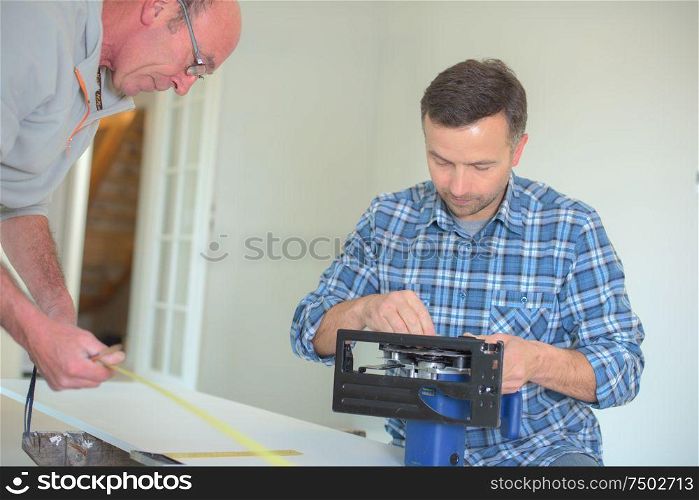 a man is working with contractor