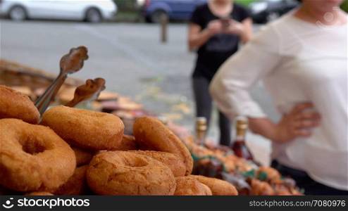 A man purchases Spanish rosquillas doughnuts