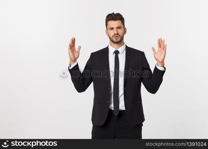 A man shows with his hands a large size on an isolated background.. A man shows with his hands a large size on an isolated background