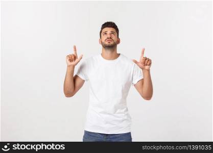 A man shows with his hands a large size on an isolated background.. A man shows with his hands a large size on an isolated background