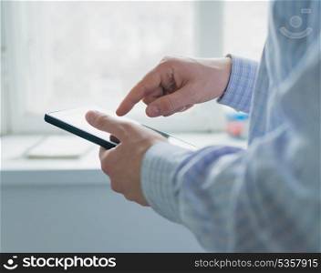 A man uses a Tablet PC