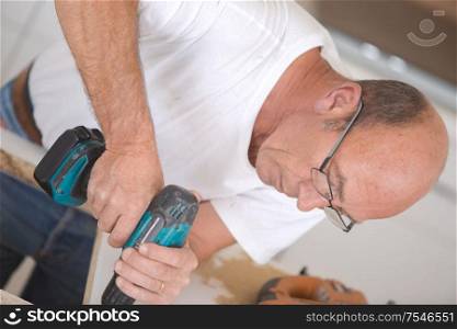 a man with power tool