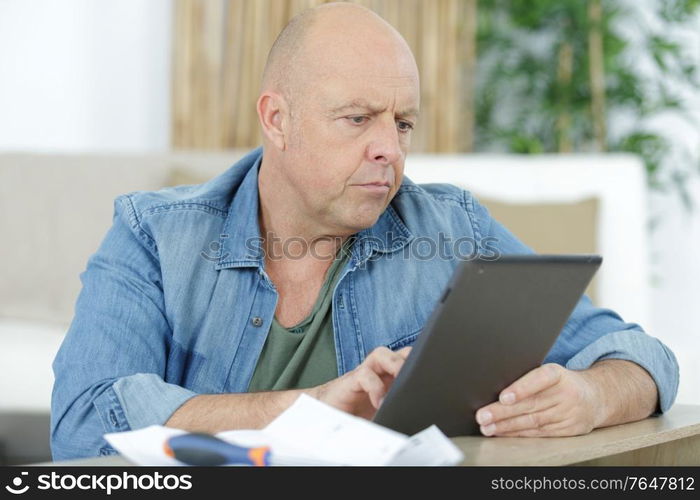 a man with tablet computer