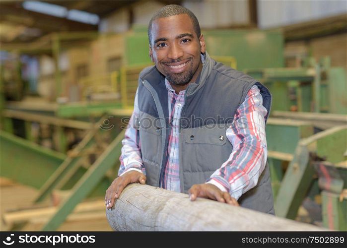 a man working in sawmill