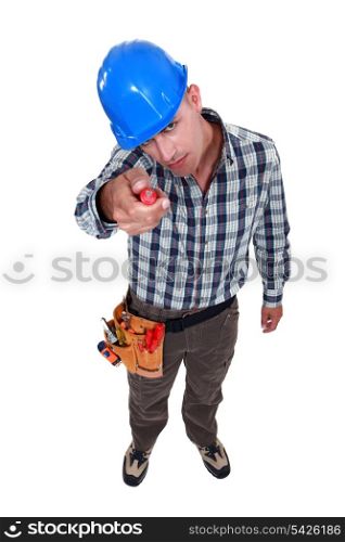 A manual worker with a screwdriver.