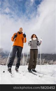 A mature couple skiing
