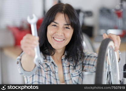 a mature woman showing spanner