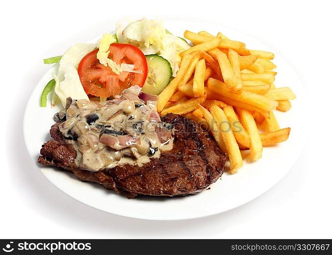 A meal of grilled steak topped with a mushroom and onion in cream sauce, served with French fried potato chips and a salad