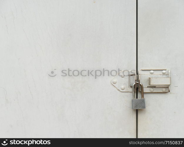 a mechanical device for securing a door or receptacle so that it cannot be opened except by a key or by a series of manipulations that can be carried out only by a person knowing the secret or code.