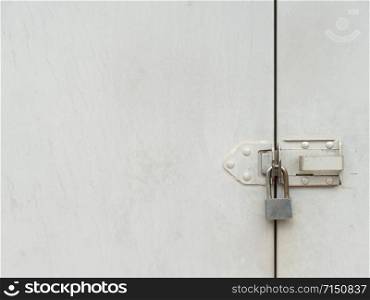 a mechanical device for securing a door or receptacle so that it cannot be opened except by a key or by a series of manipulations that can be carried out only by a person knowing the secret or code.