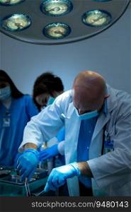 A medical professor is teaching surgery to medical students working at an international medical hospital.