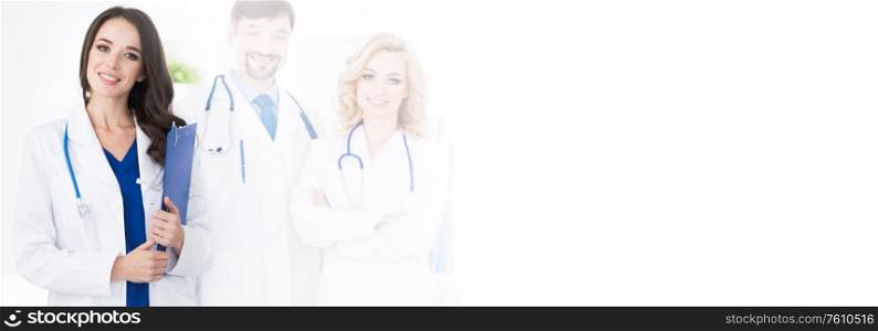 A medical team of doctors, men and woman, isolated on white background with copy space. Medical team of doctors