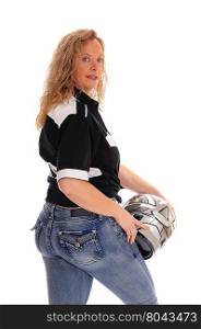 A middle age woman standing in jeans, holding her motorcycle helmet,isolated for white background.