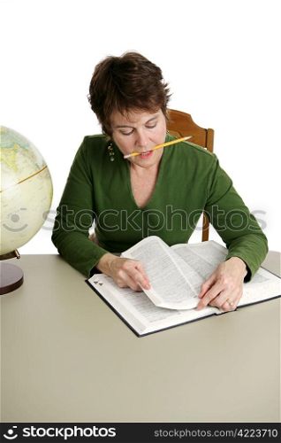 A middle aged student, or librarian, doing research in the library. Isolated on white.Note to inspector: Texture of the shirt may resemble artifacting.