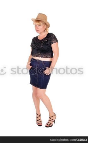 A midge woman in a skirt and black blouse wearing a cowboy hat,isolated for white background.