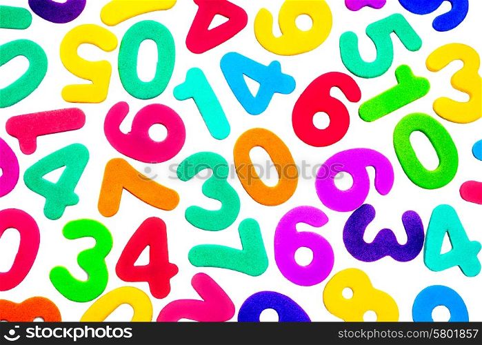 A mix of different single digit numbers from zero to nine, of different bright colours, on a white background.
