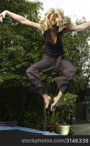 A model bounces into some dynamic poses and is lit well. Melbourne 2003 Ewing.