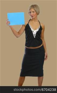 A model poses with a card for text insertion.