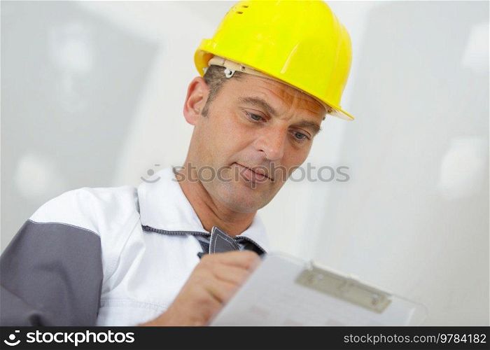 a modern builder with clipboard