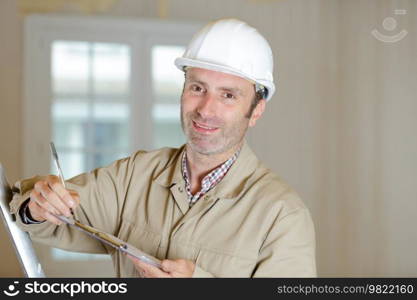 a modern builder with clipboard