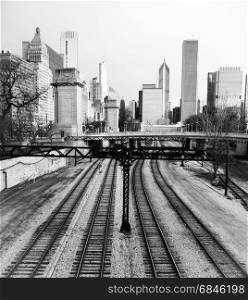 A monochrome representation of the railyards and buildings of Chicago
