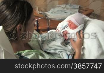 A mother bonds with her newborn at the hospital