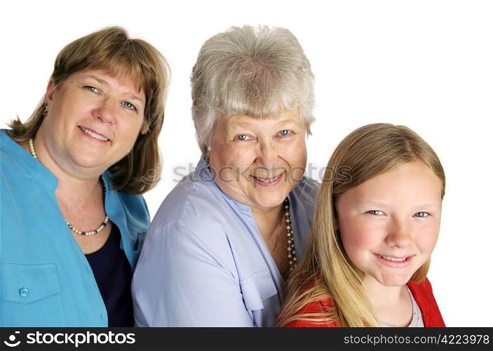 A mother, grandmother and little girl enjoying being together. Isolated on white.
