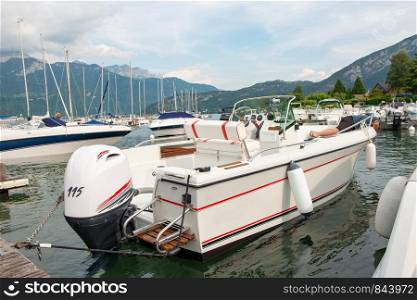 a motor boat in the port of Saint Jorioz on Lake Annecy