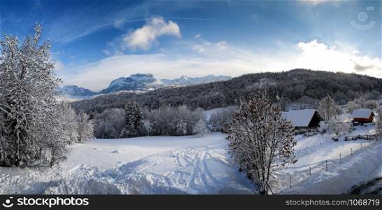 A mountain landscape in the snow in the Alps