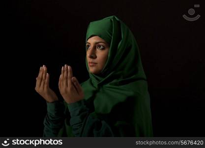 A Muslim woman praying