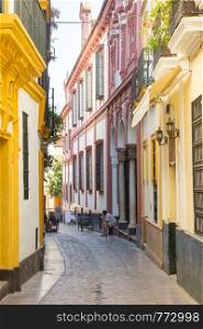 A narrow street in Seville's old city