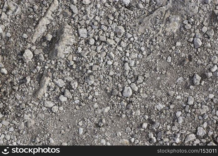 A Natural stone background texture with small stones in horisontal position