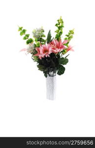 A nice bunch of silk lilies with some green branches in a white vasefor white background.