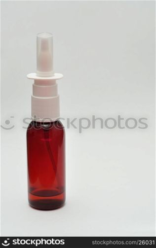 A nose spray bottle isolated on a white background