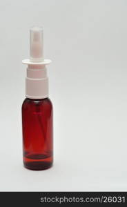 A nose spray bottle isolated on a white background