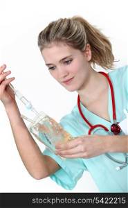 A nurse checking a perfusion.