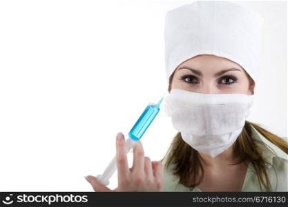A nurse in a white cap and white band with injection