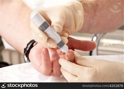 a nurse or doctor measures a patient&acute;s blood sugar.