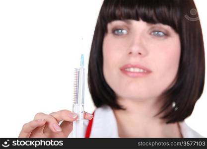 a nurse preparing an injection