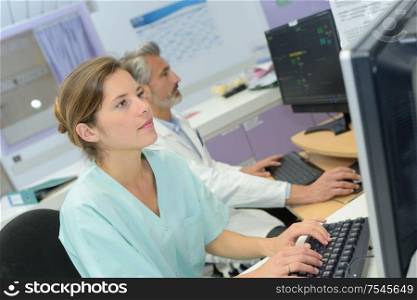 a nurse using a computer