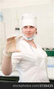 A nurse with syringe