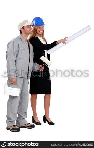 A painter and a working woman conferring