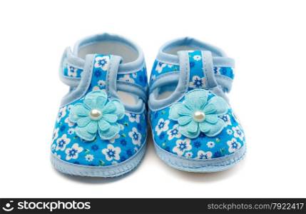 A pair of blue baby shoes. Isolate on white.