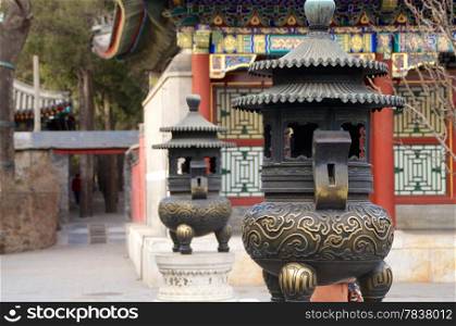 A Pair of Copper Incense Burners Standing At The Summer Palace In Beijing