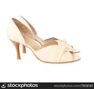 A pair of elegant beige leather lady shoes - front and side view