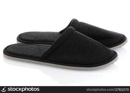 A pair of grey slippers on a white background.