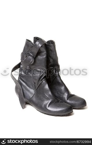 a pair of leather boots ladies black color