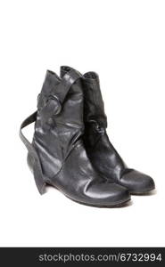 a pair of leather boots ladies black color